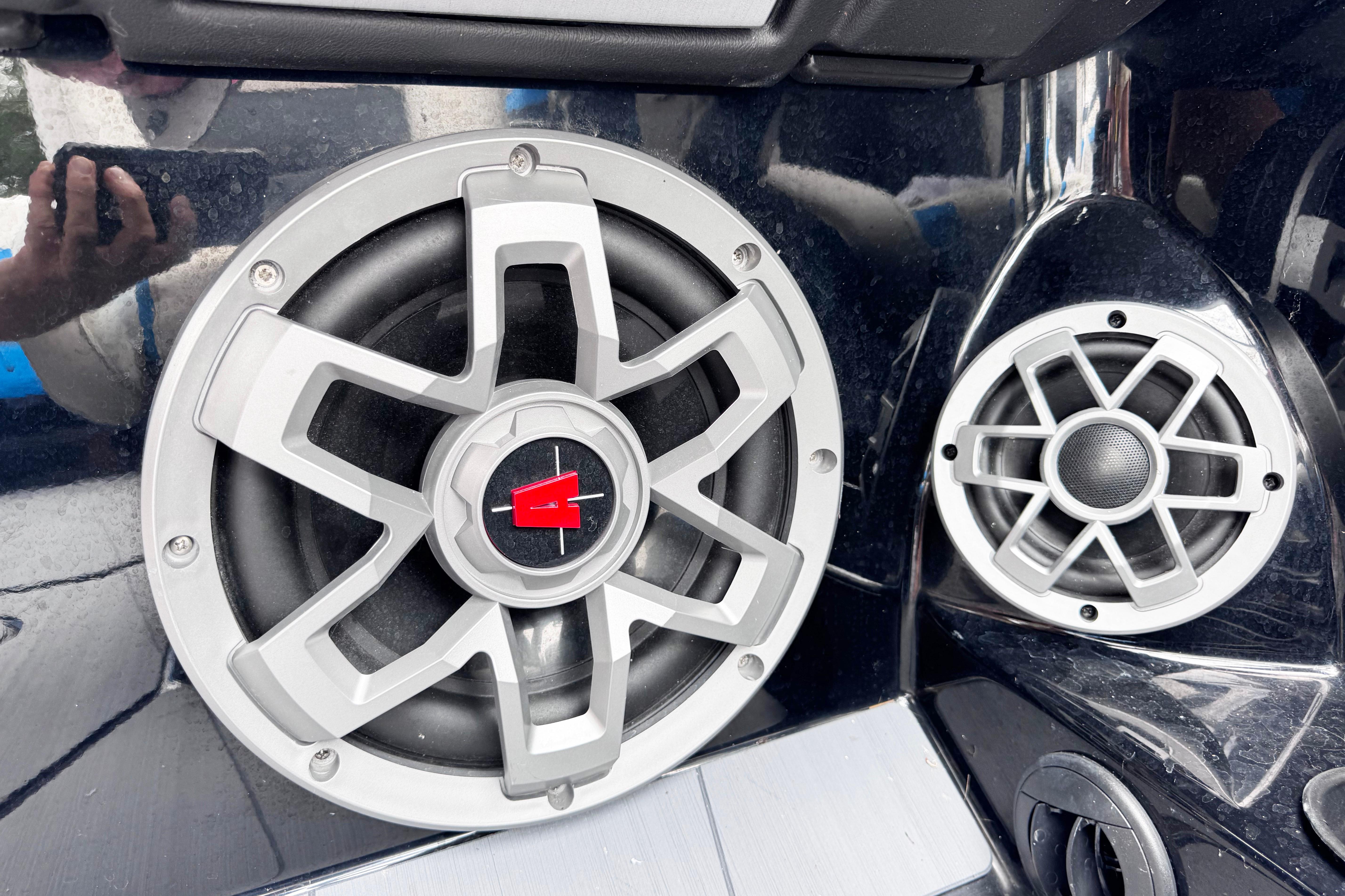 Close-up of Axis T220 2022 boat speakers with sleek silver design.
