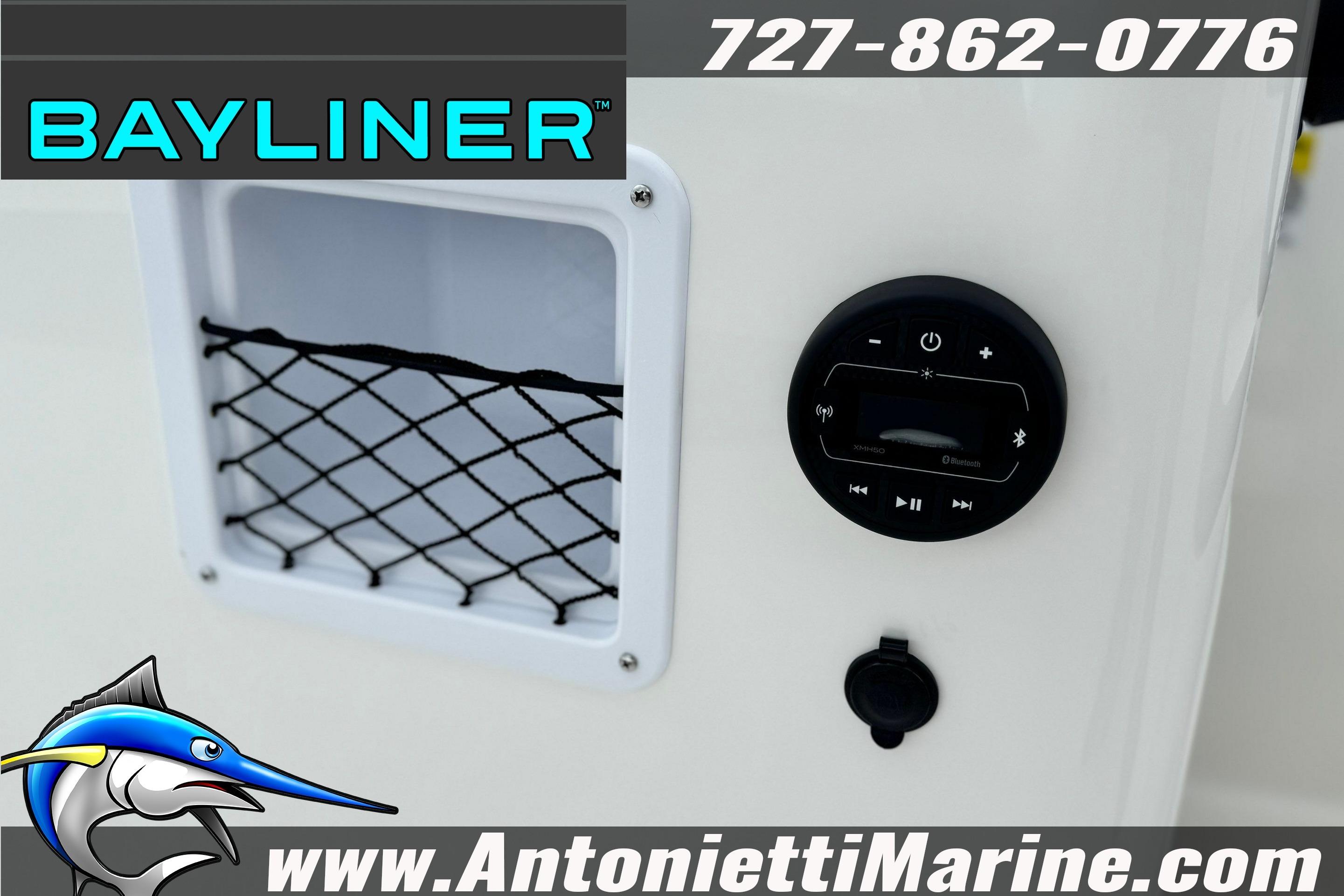 2026 Bayliner Element E16 boat dashboard with Bluetooth controls and storage net.
