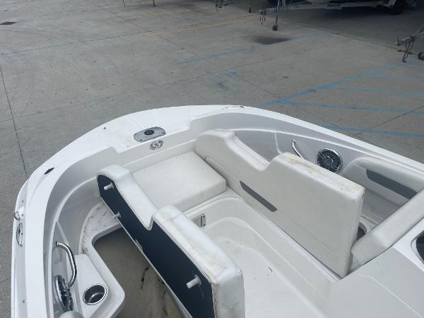 2022 Hurricane SS185 OB boat interior with white seating and cup holders.
