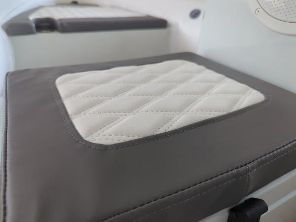 Quilted seat cushion on 2025 Tide Craft San Juan 11 boat interior.