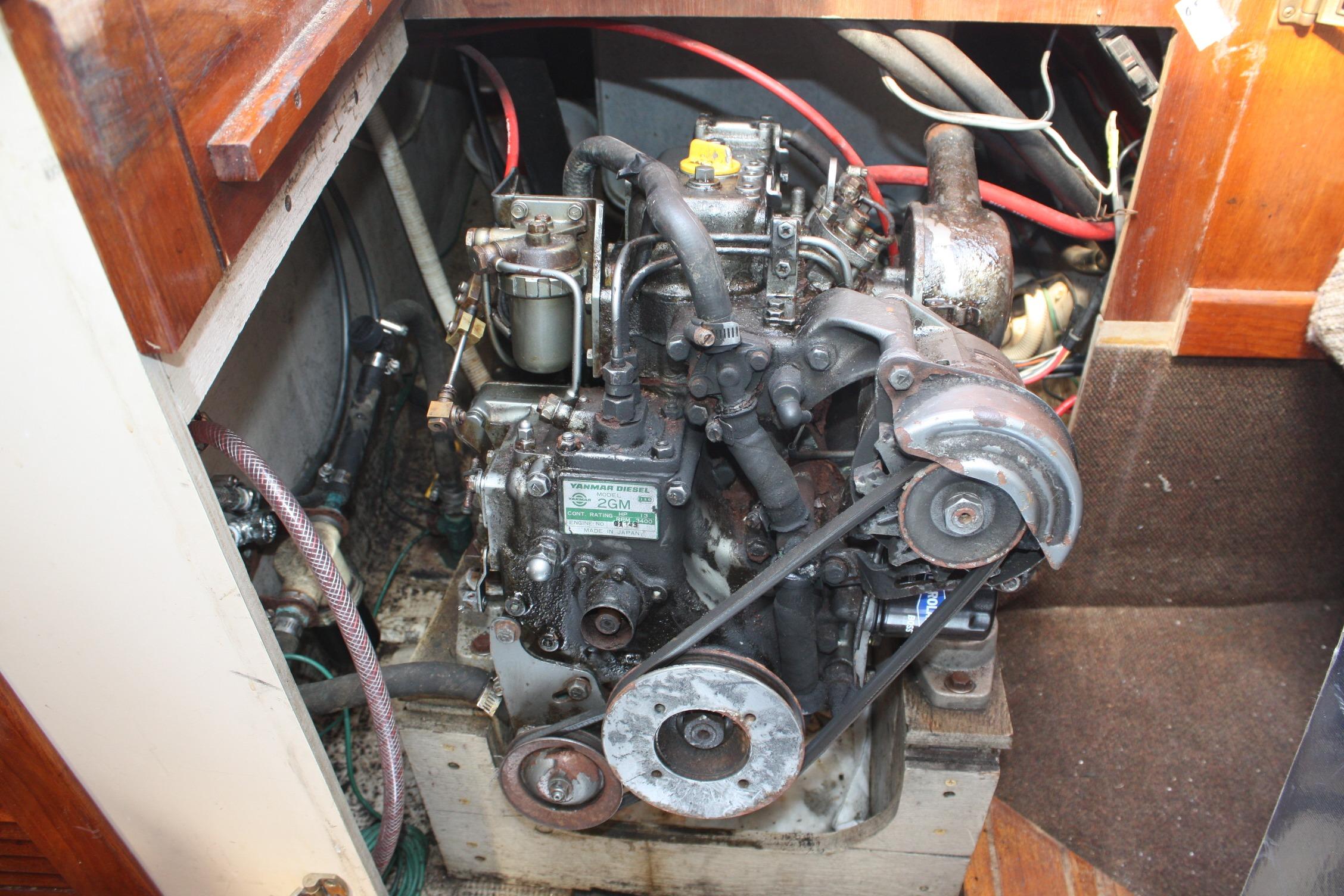 Engine compartment of a 1981 S2 9.2A sailboat, featuring a Yanmar diesel engine.