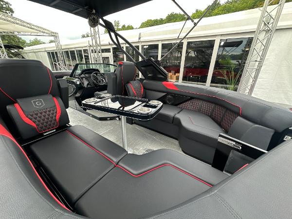 Luxurious interior of 2024 Godfrey XP 27' Windshield boat with sleek seating and modern design.