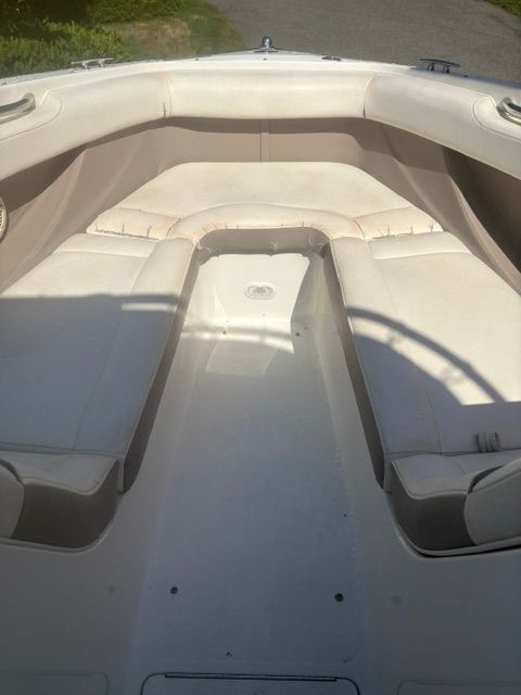 The image shows the bow area of a 2003 Cobalt 240 boat with cushioned seating.