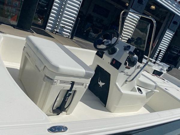2024 Mako Pro Skiff 15 CC boat interior with console and seating.