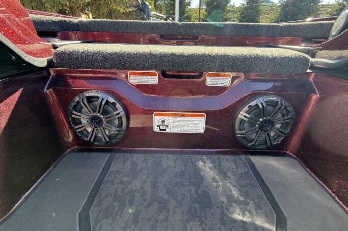 2026 Nitro Z21 XL Pro boat interior with dual speakers and cushioned seating.