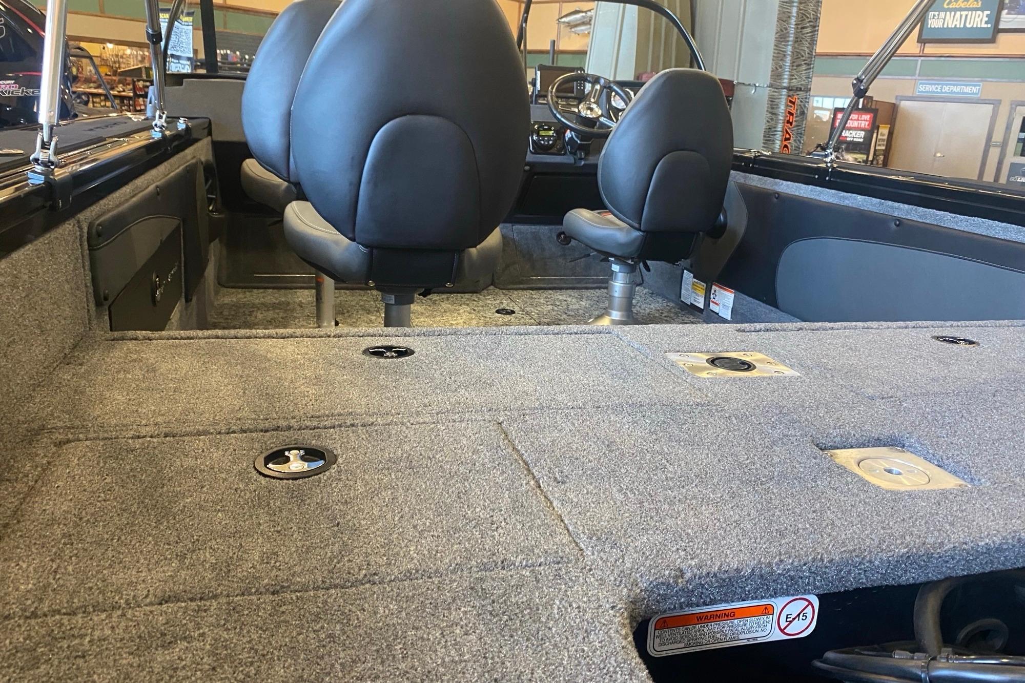 2026 Tracker Targa V-19 WT boat interior with seating and carpeted deck.