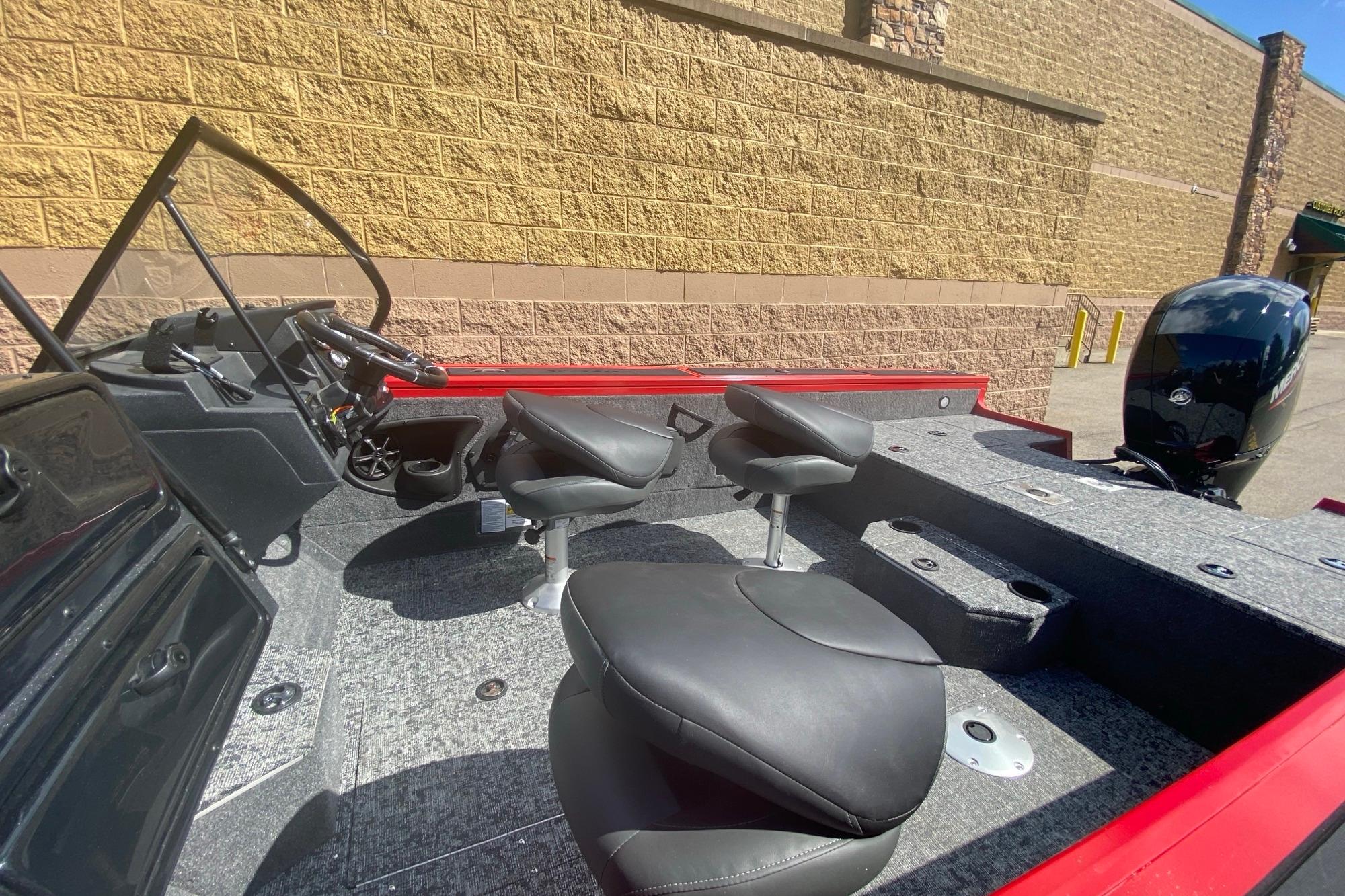 2026 Tracker Targa V-18 WT boat interior with seating and steering console.