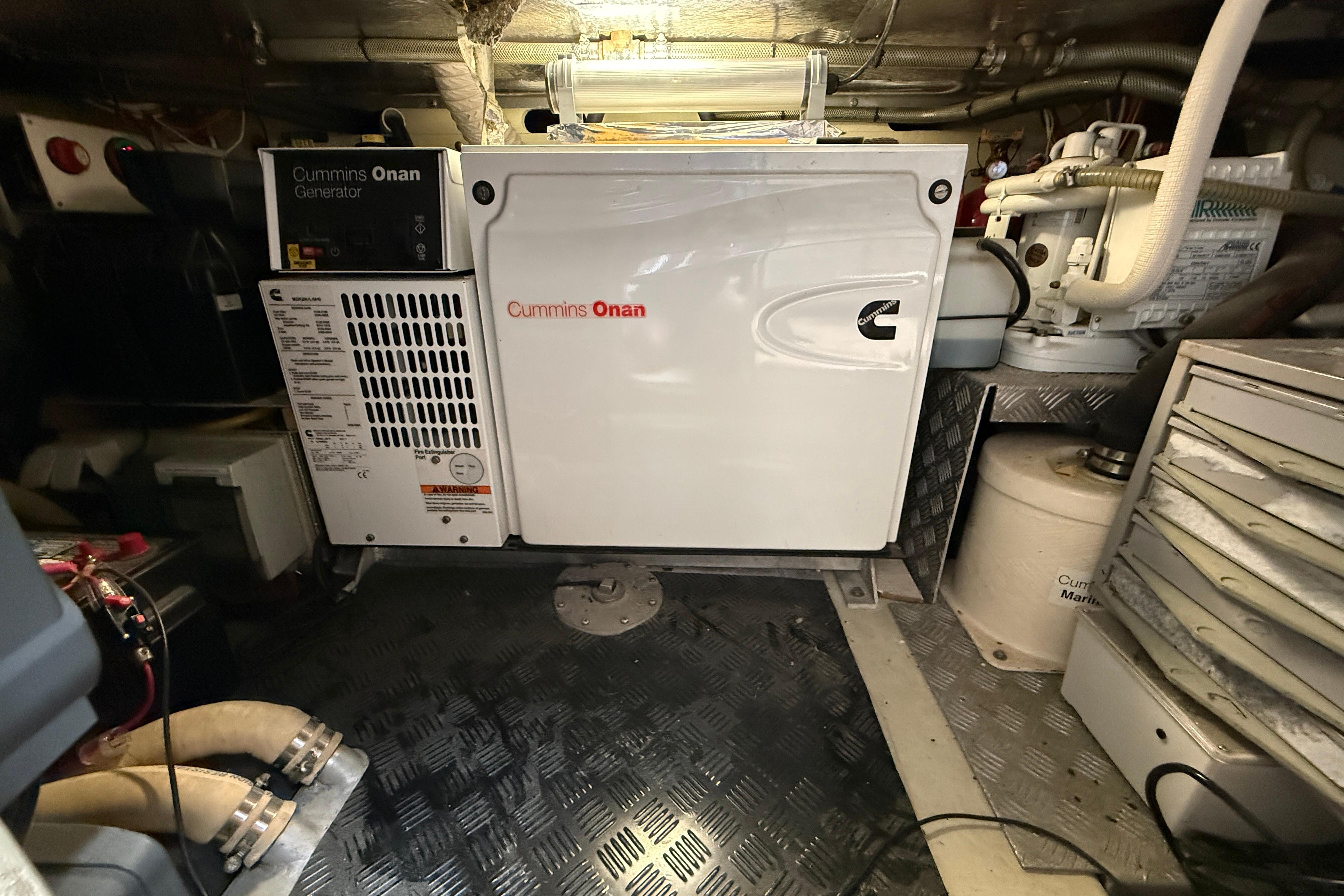 Engine room of 2013 Windy SR52 with Cummins Onan generator.