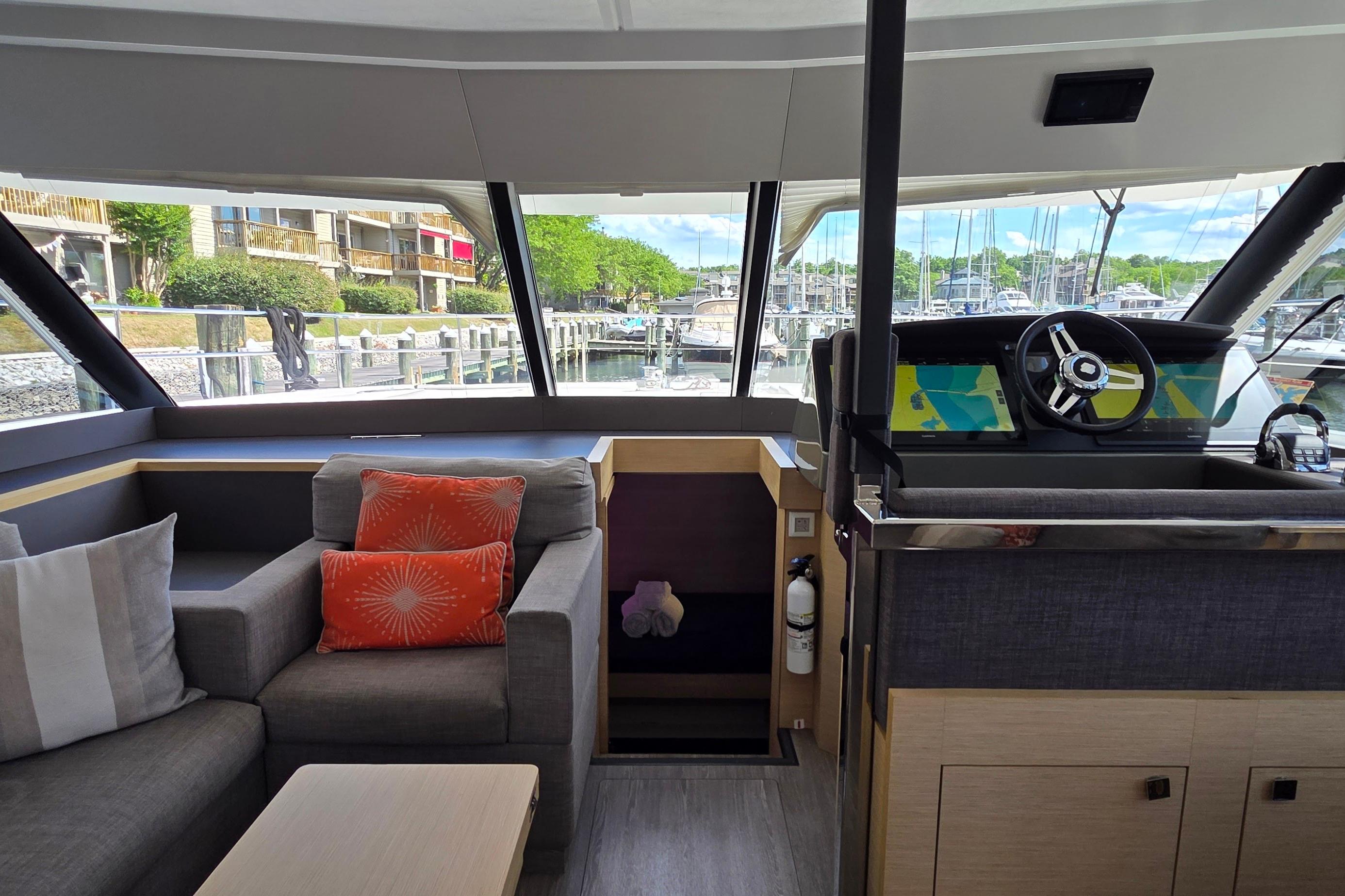 Interior of 2018 Fountaine Pajot Motor Yacht 44 with helm and seating area.