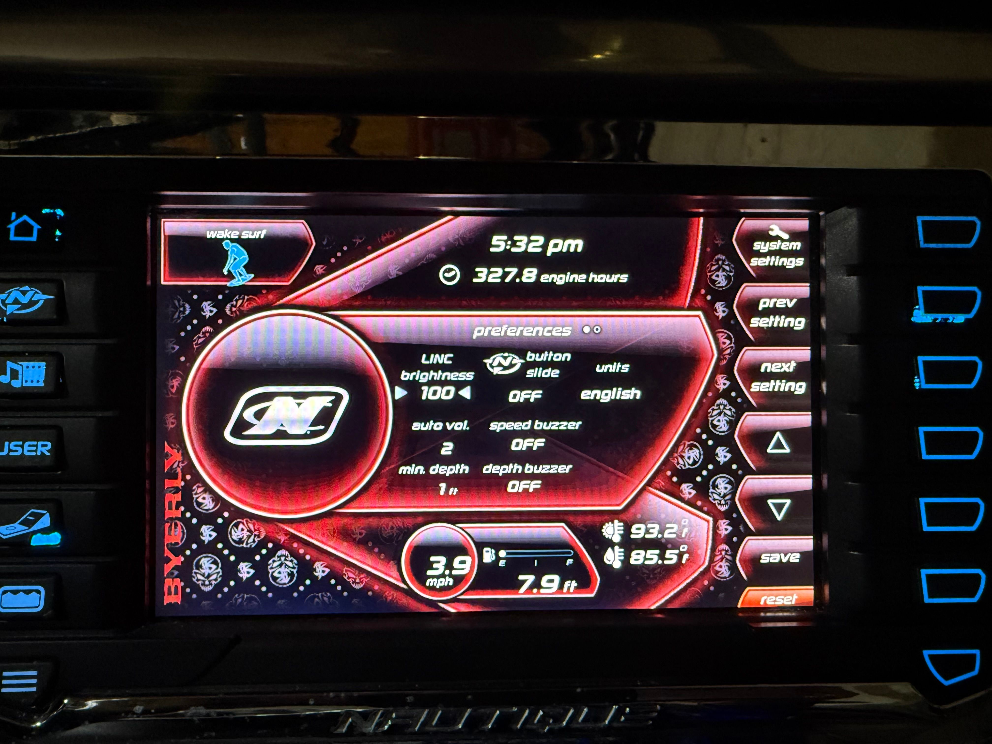 2012 Nautique Super Air Nautique 210 control panel with display.