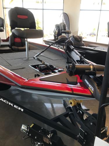 2025 Tracker Pro Team 175 boat with Minn Kota trolling motor in showroom.