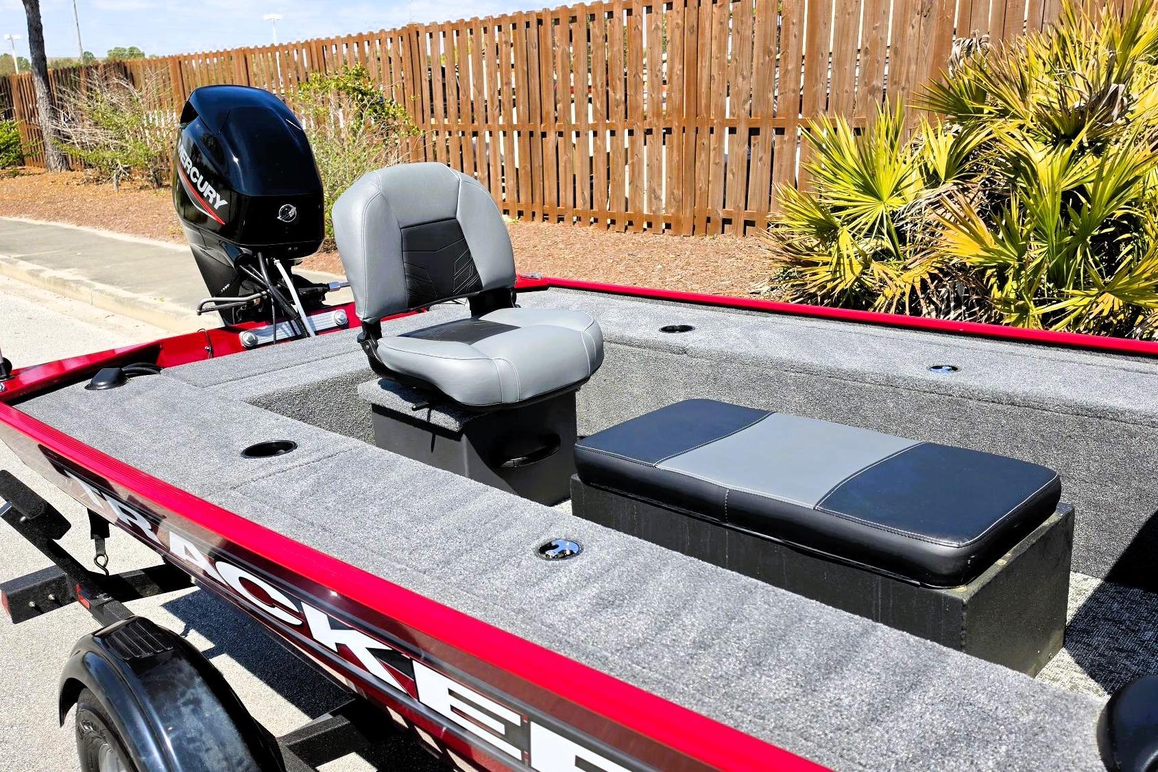 2026 Tracker Panfish 17 boat with Mercury engine, featuring comfortable seating and sleek design.