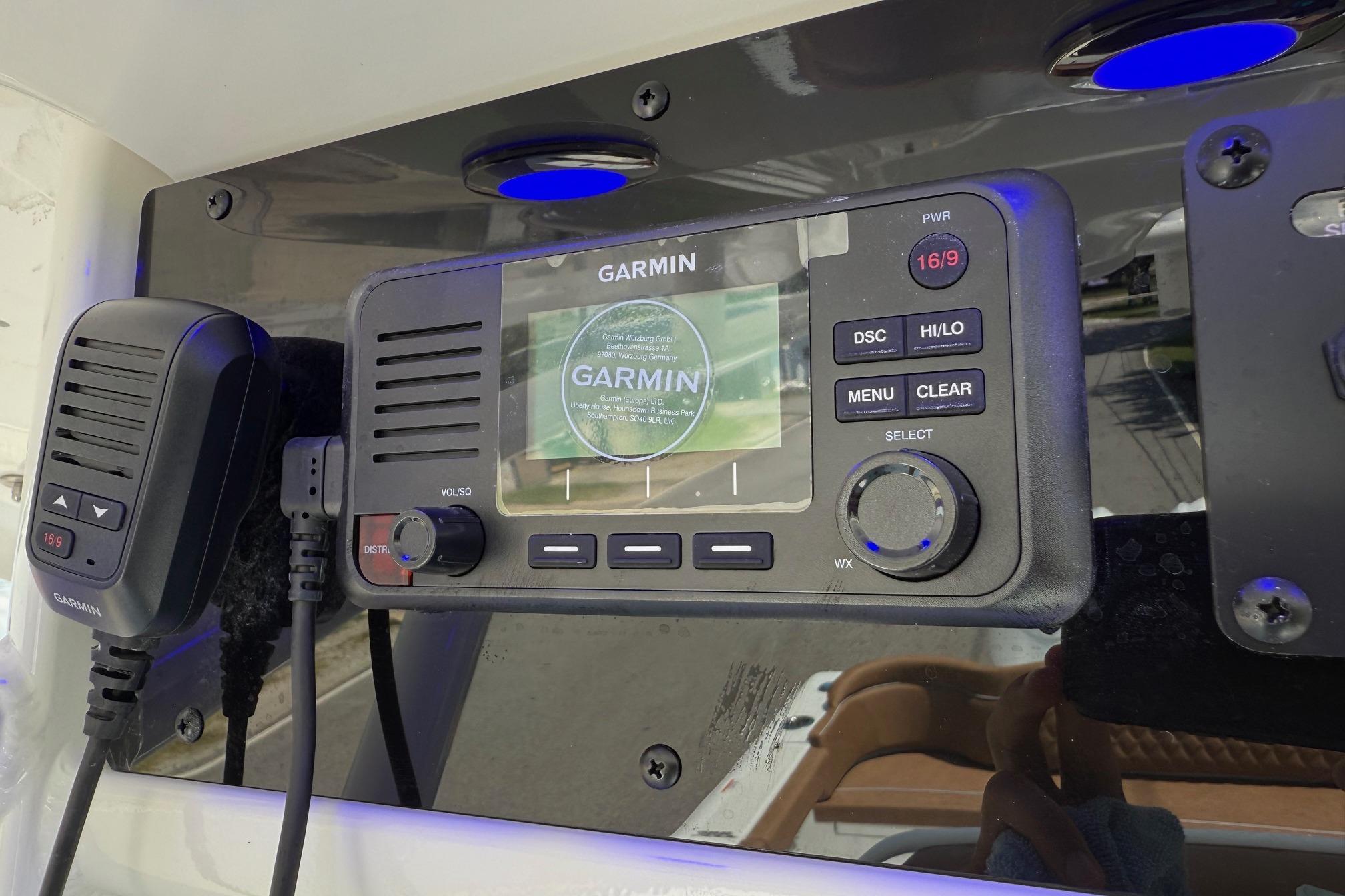Garmin marine radio on 2026 Sea Hunt Ultra 305 SE boat dashboard.