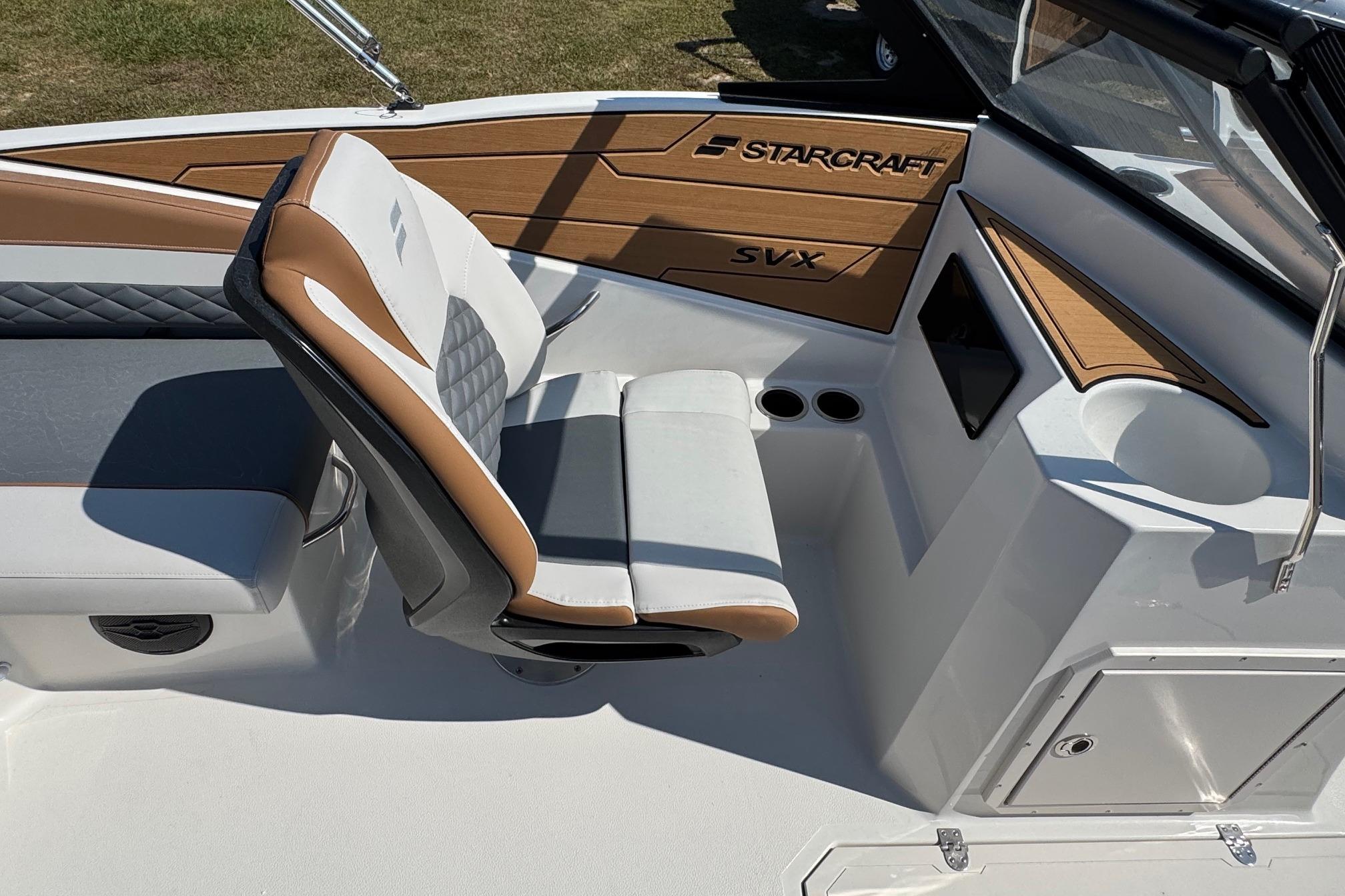 2026 Starcraft SVX 190 OB boat interior with cushioned seating and modern design.