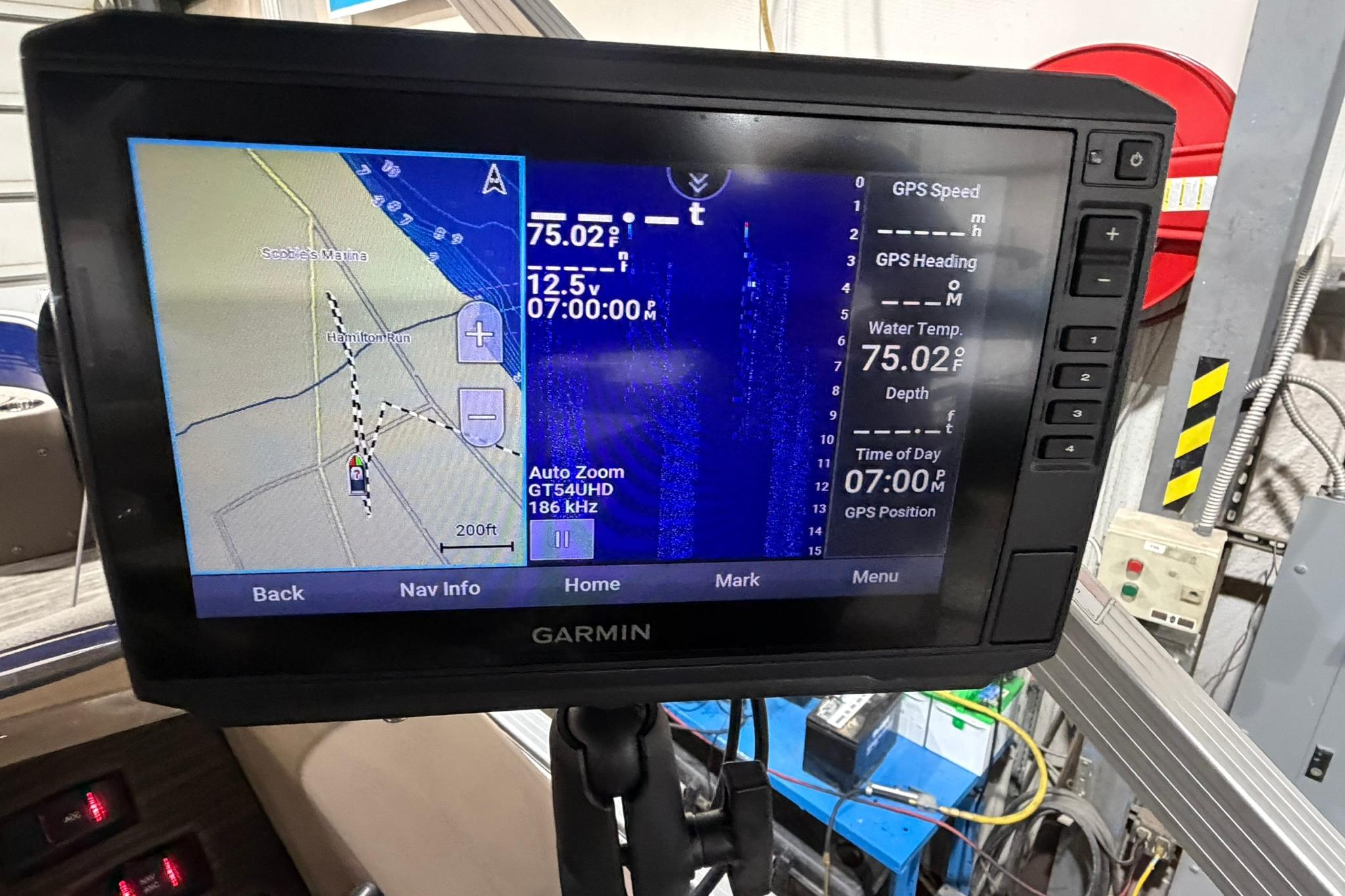 Garmin GPS display on a 2020 Bennington SX 22 SFX showing navigation and water temperature.
