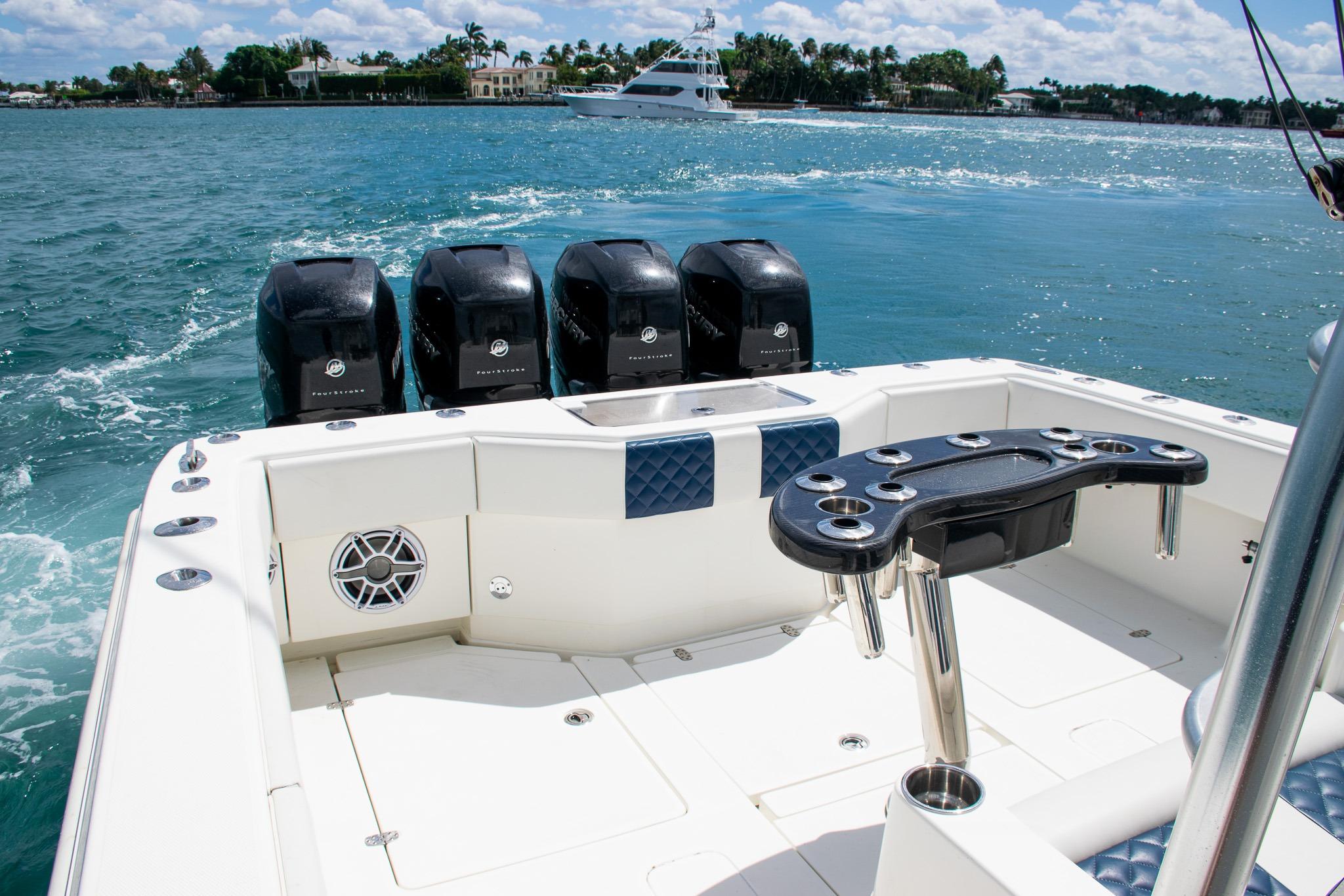 2022 SeaVee 390Z boat with quad outboard engines on a sunny day.