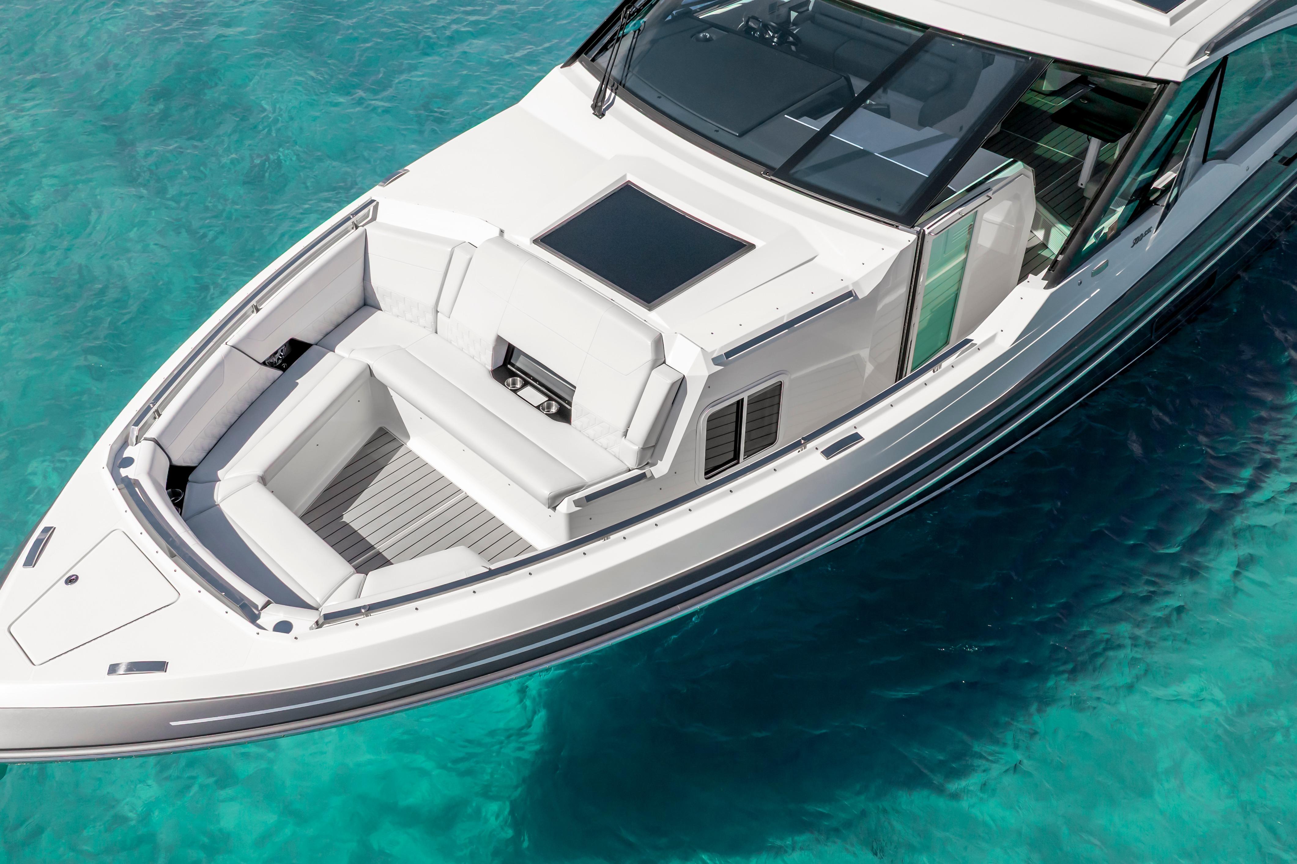 2022 Formula 500 Super Sport Crossover boat on clear turquoise water.