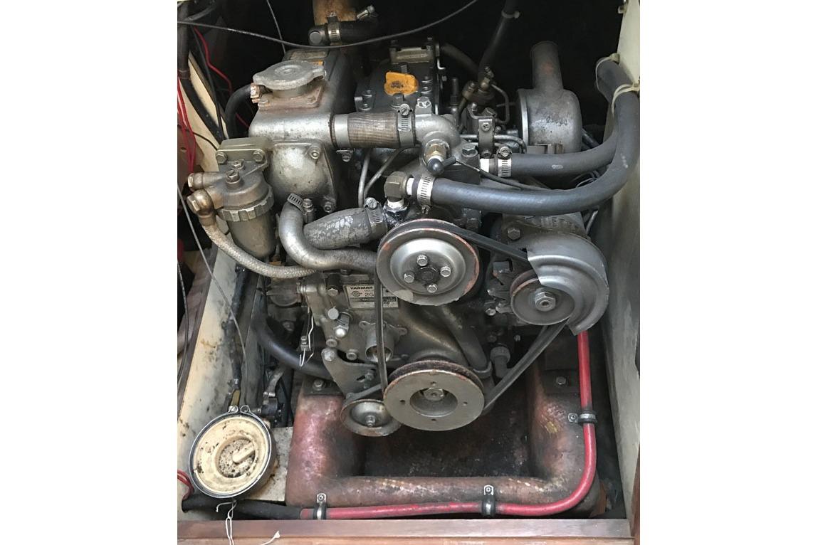 1983 Pearson 303 engine, detailed view of mechanical components and hoses.