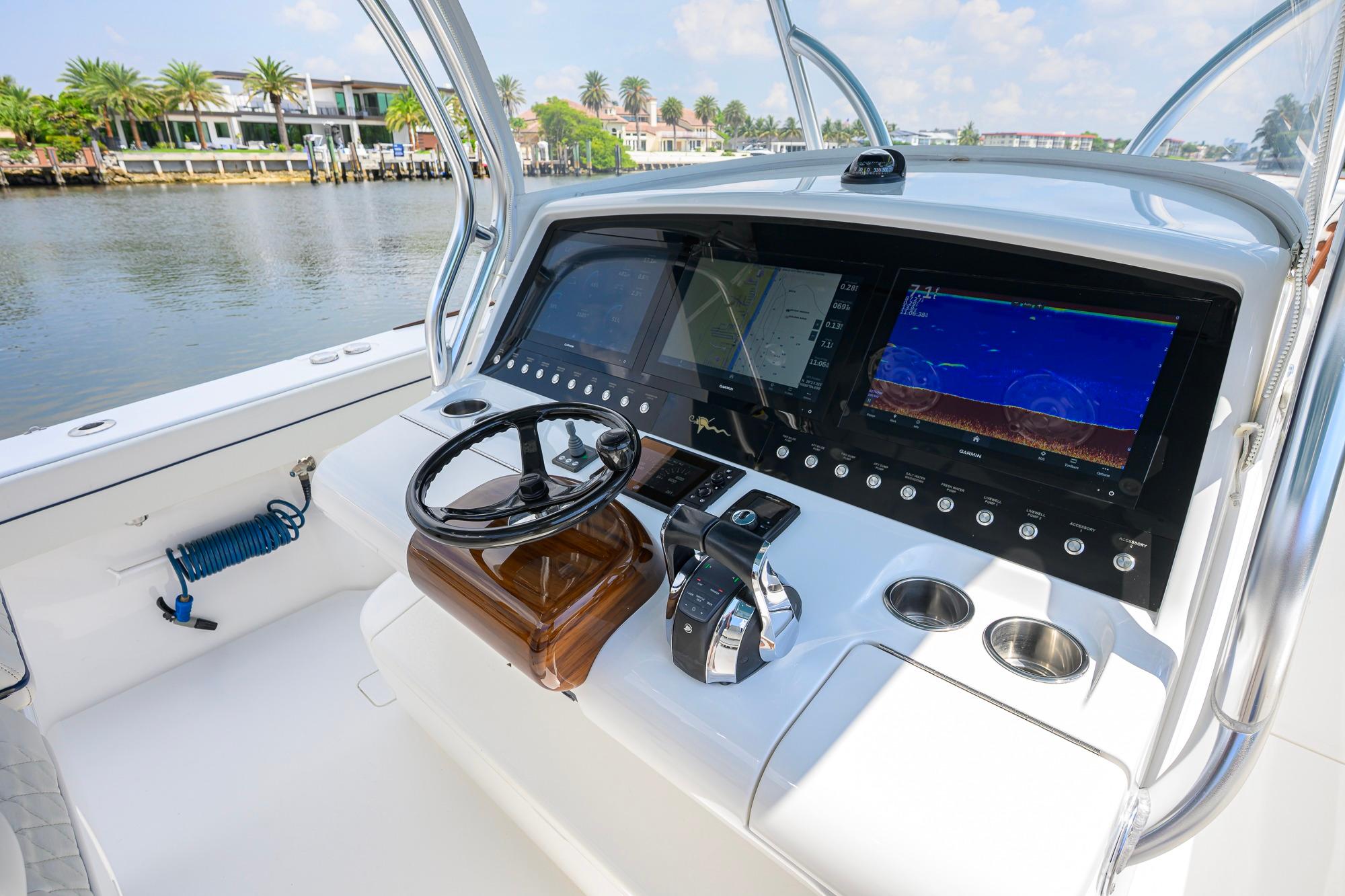 2020 Valhalla Boatworks V-41 helm with advanced navigation displays and controls.