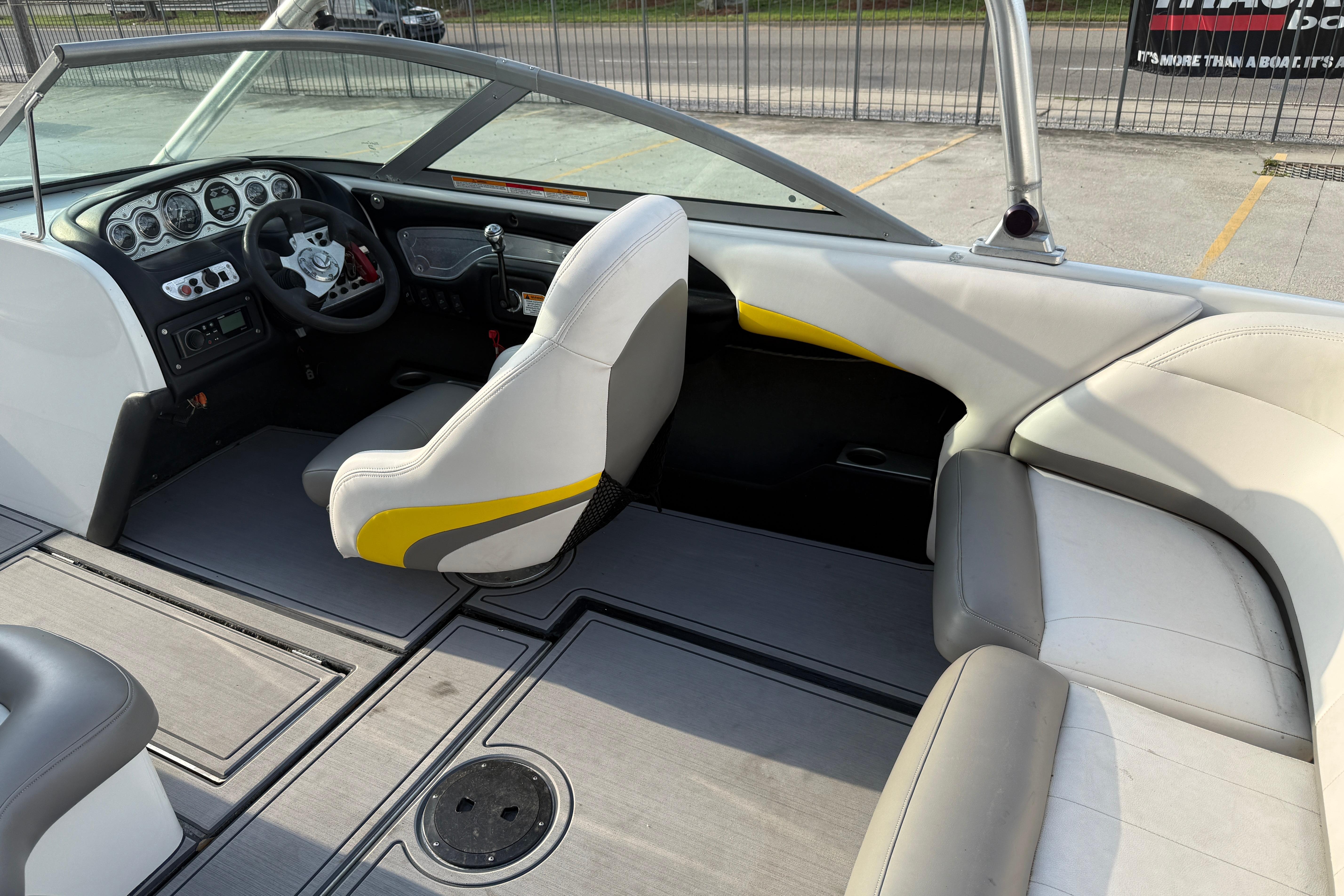 2005 MasterCraft X10 boat interior with steering wheel and seating.