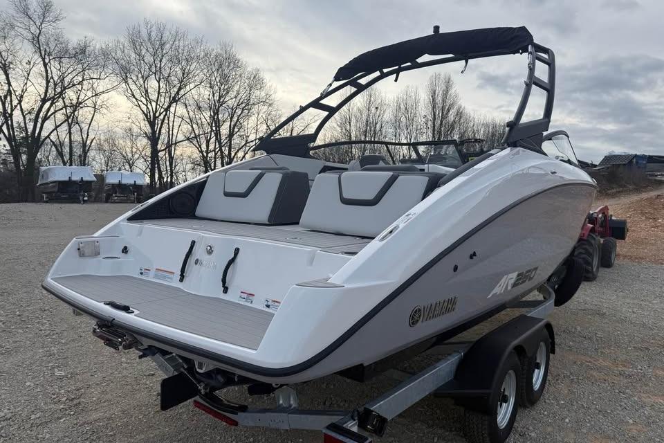 2026 Yamaha Boats AR250 on trailer, sleek design, parked outdoors.