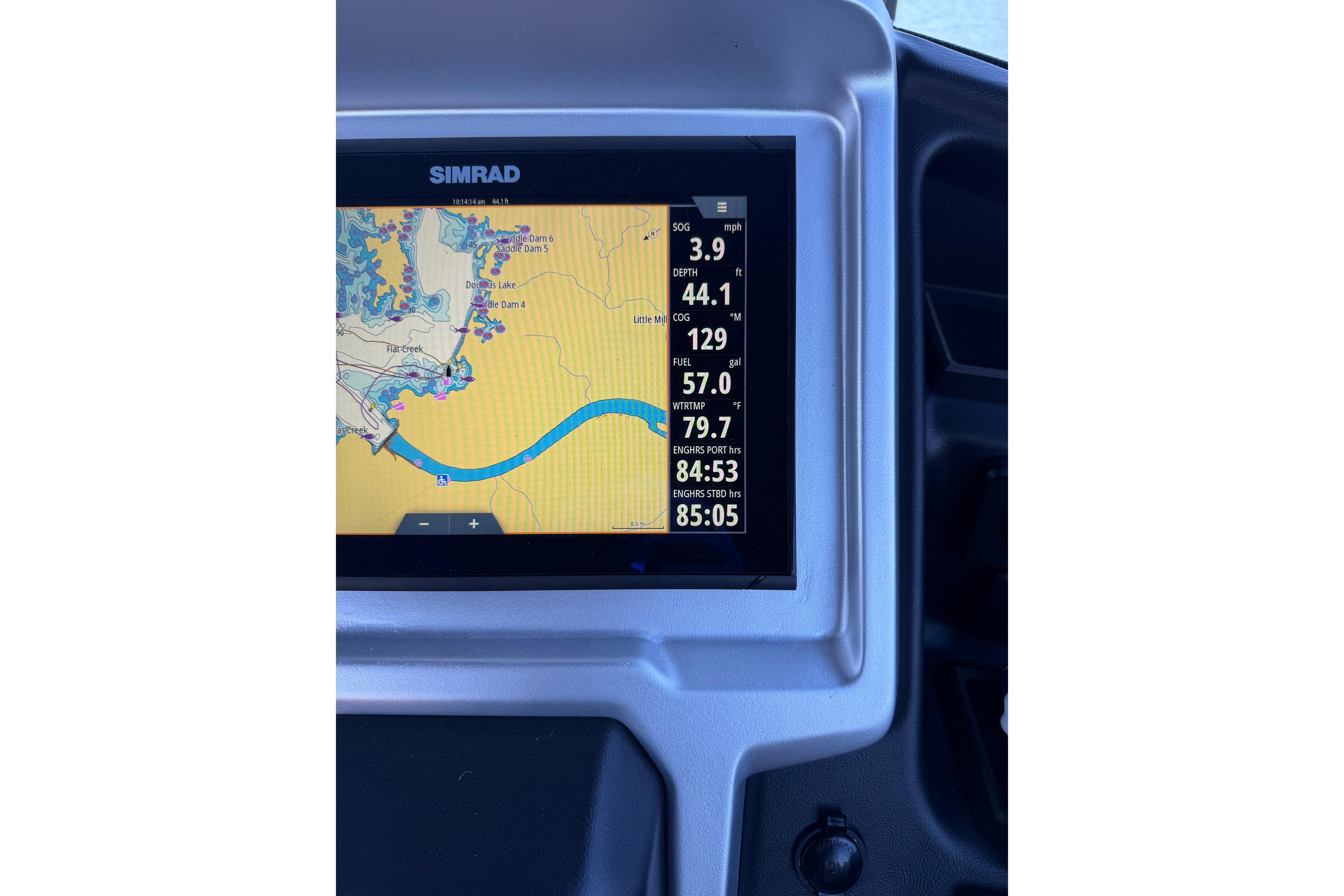Simrad navigation display on 2023 Premier 270 Intrigue RF boat dashboard.
