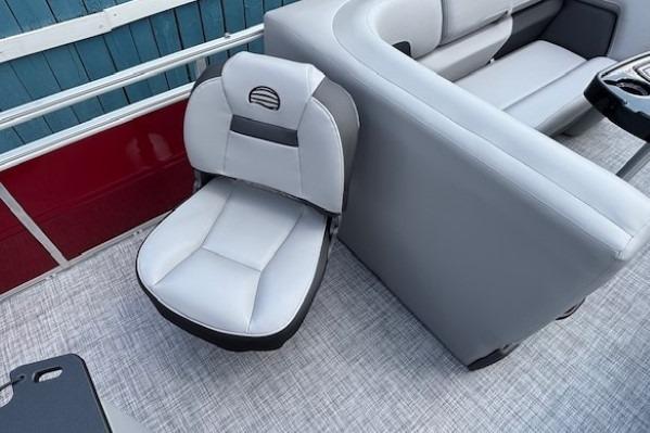 2026 Sun Tracker SportFish 20 DLX boat interior with gray seating and modern design.
