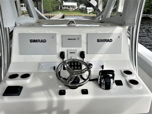 2020 Front Runner 39 Center Console boat dashboard with Simrad displays and Mercury controls.