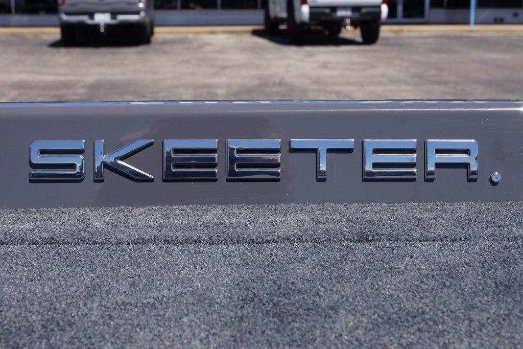 2026 Skeeter ZXE21 logo on a vehicle, showcasing sleek metallic design.