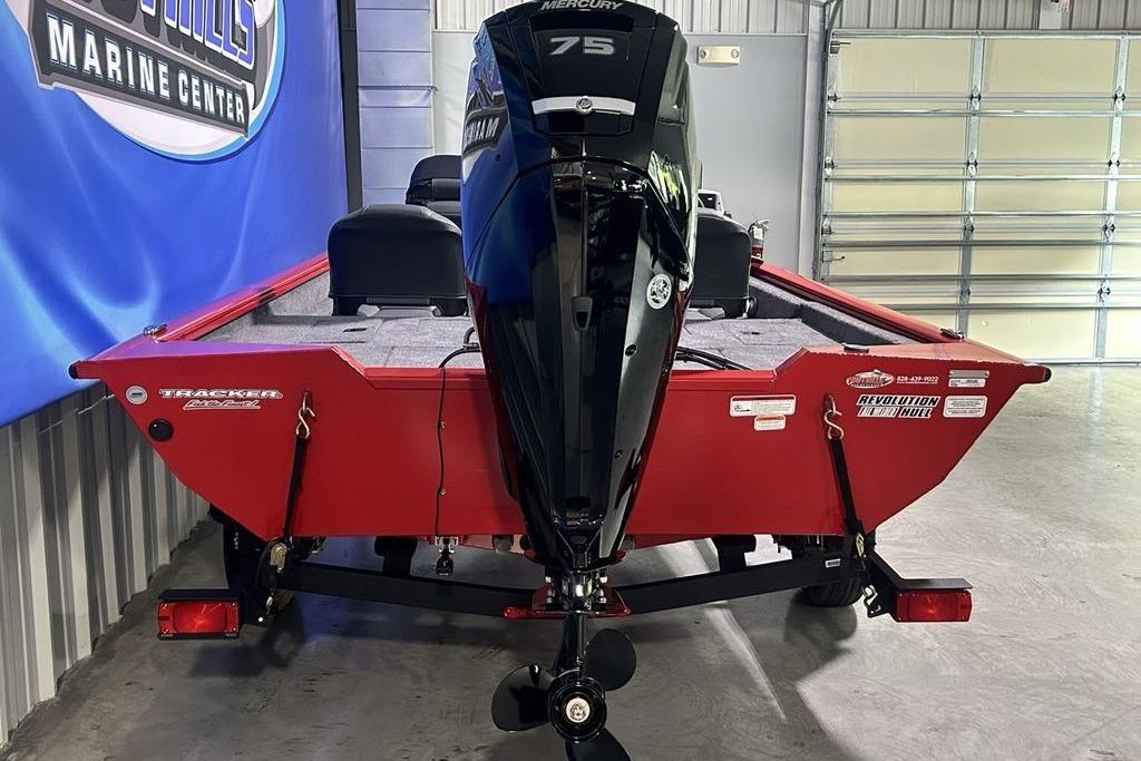 2026 Tracker Pro Team 175 Crappie Edition boat with Mercury 75 engine in showroom.