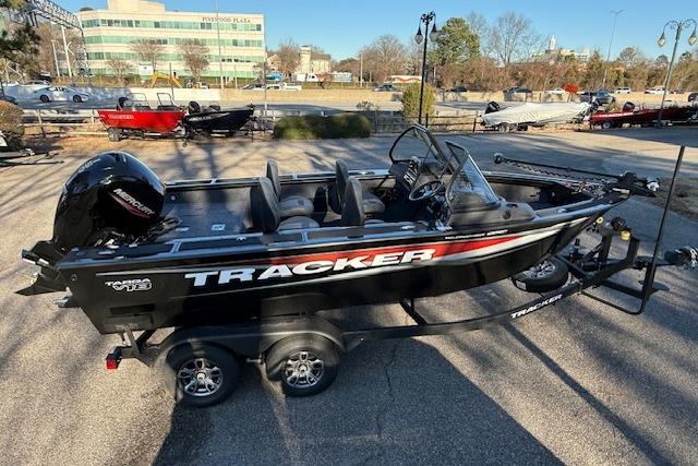2026 Tracker Targa V-18 WT boat on trailer, parked outdoors.