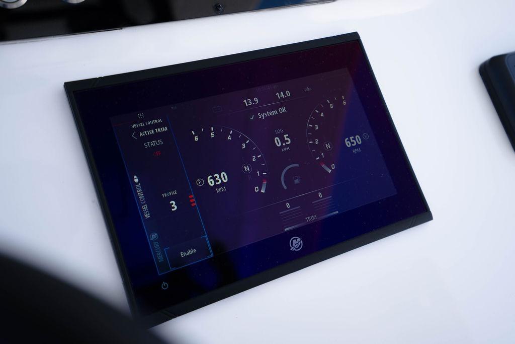 Digital dashboard display of a 2027 Reef Runner 340 boat, showing RPM and system status.