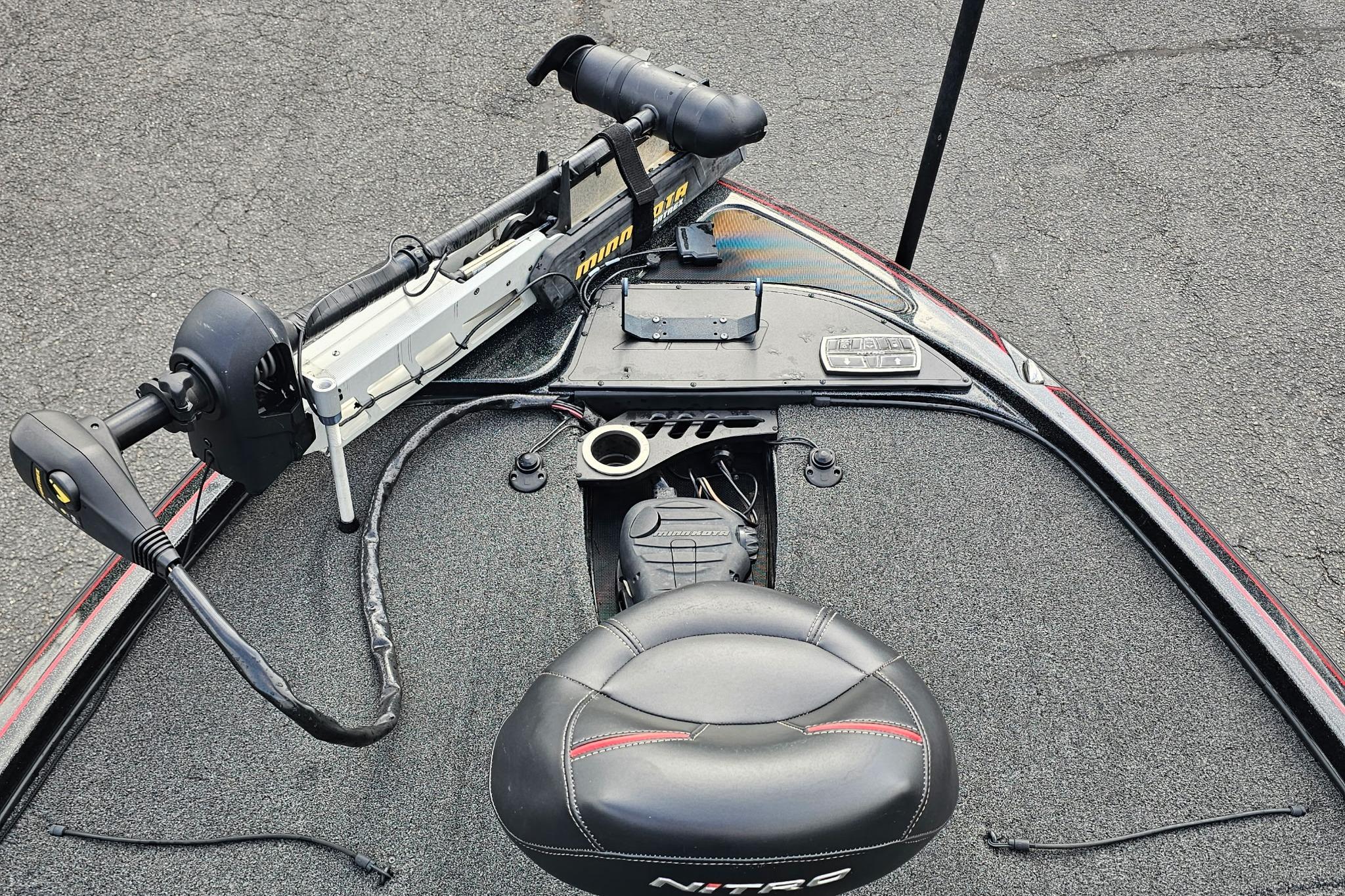 Front deck of a 2017 Nitro Z20 Pro fishing boat with trolling motor and seat.