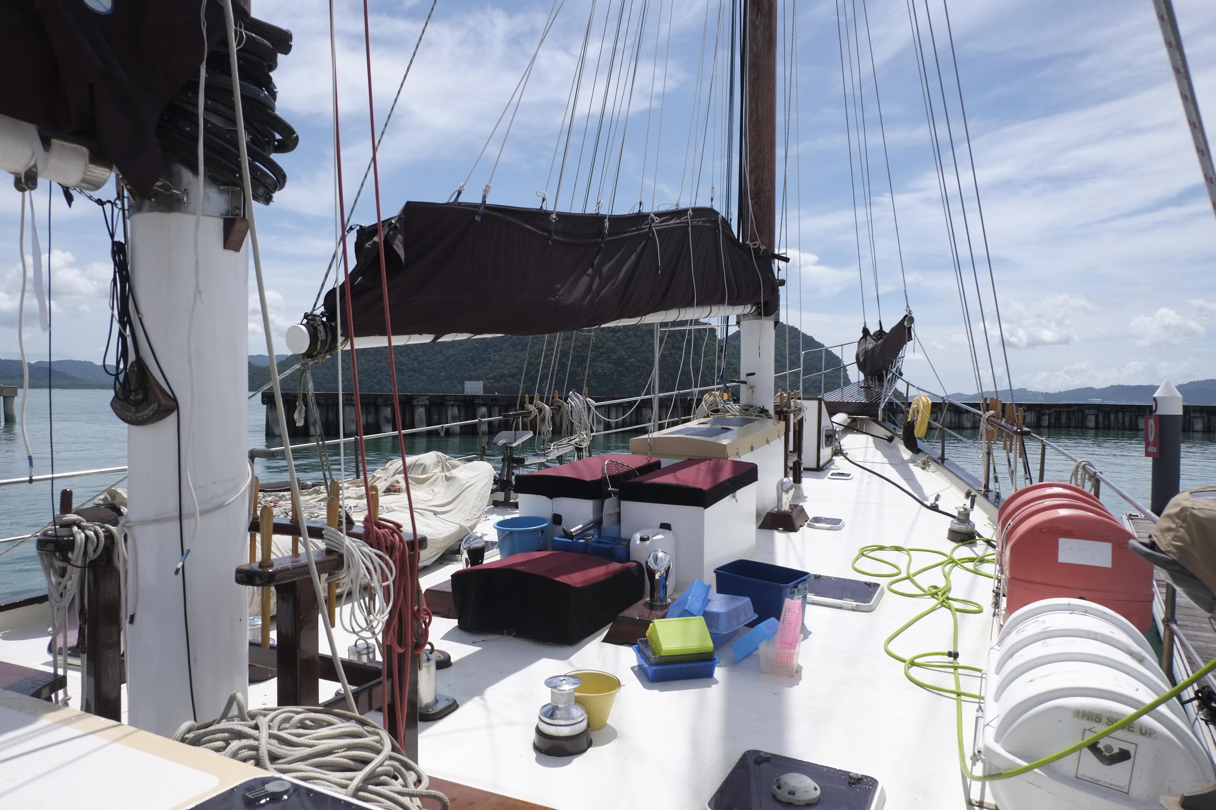 Custom Bud Macintosh schooner deck, 2006 model, with ropes and equipment under a clear sky.