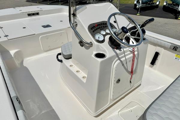 2025 Carolina Skiff 21 LS boat console with steering wheel and gauges.