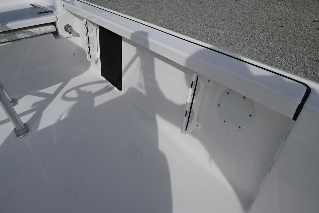 2026 Tidewater 1910 Bay Max boat interior with steering wheel and seating area.
