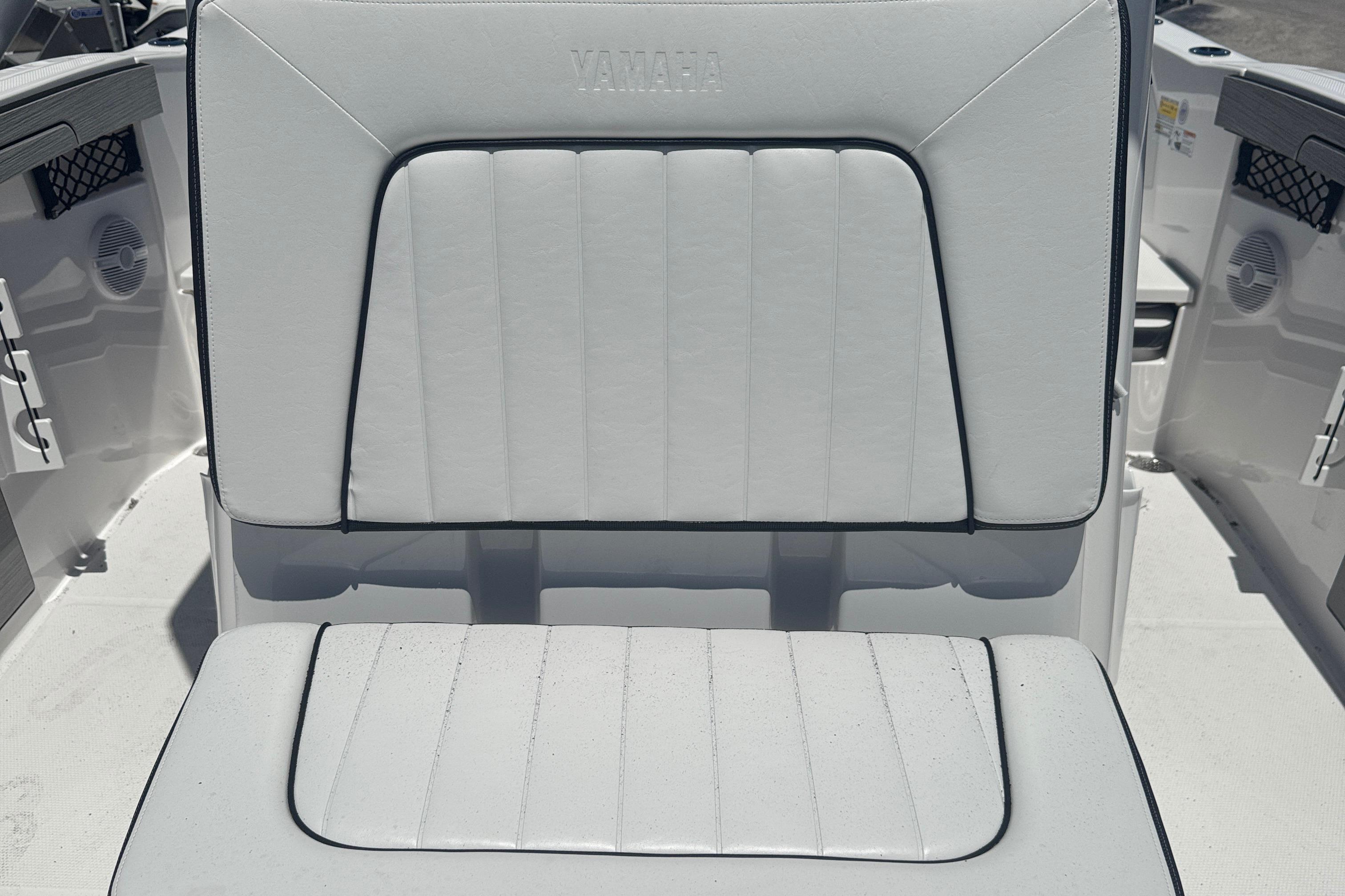 2026 Yamaha Boats 220 FSH Sport, white cushioned seating detail.