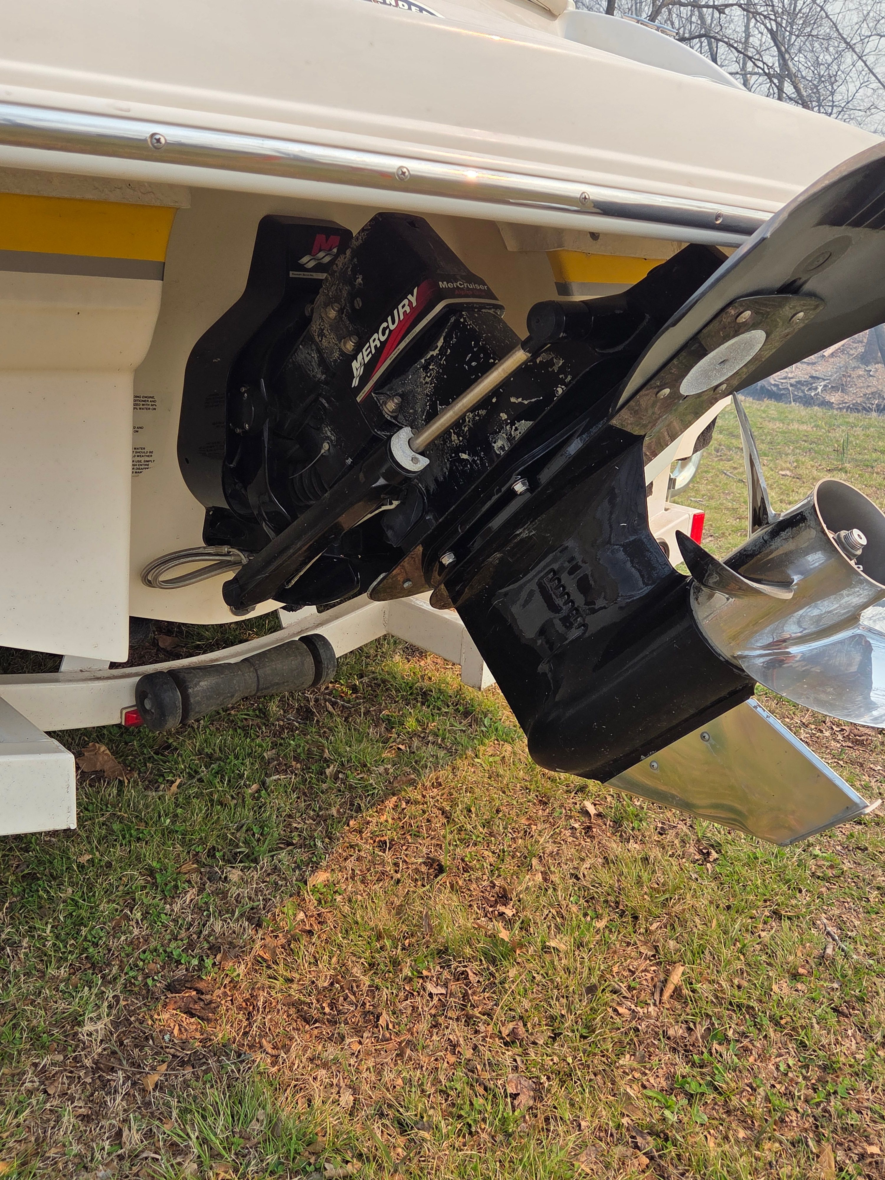 Rear view of a 2003 Chaparral 210 SS boat with Mercury drive.