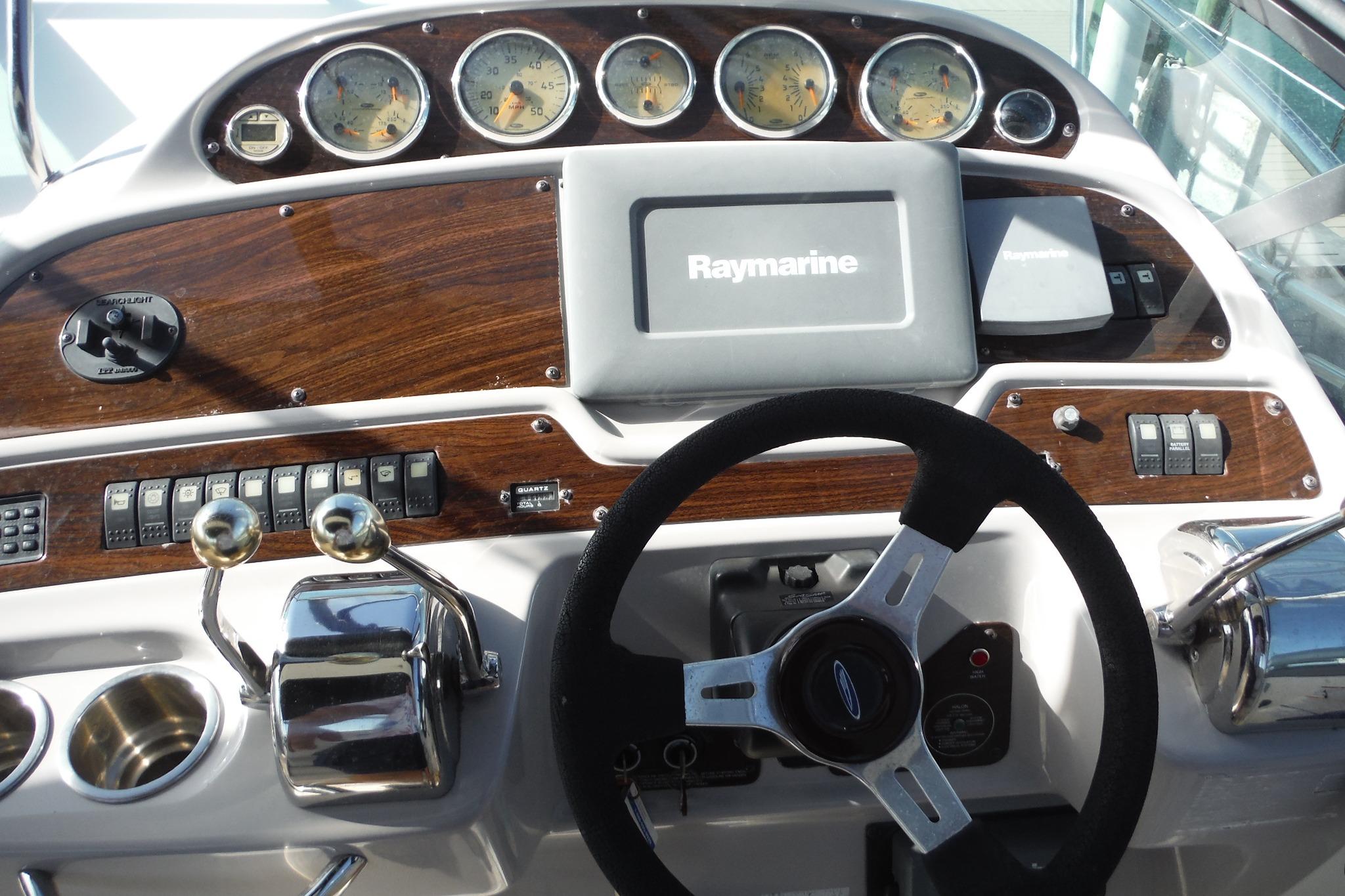 Control panel of a 2005 Chaparral Signature 350 boat with Raymarine navigation system.