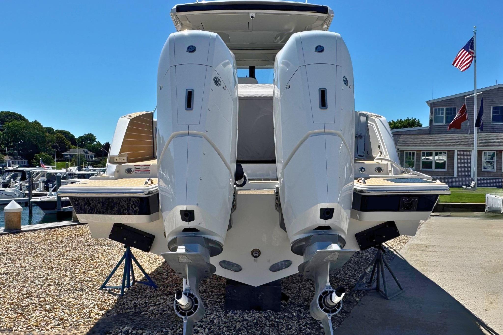 2027 Tiara Yachts 39 LE with dual outboard engines at a marina.