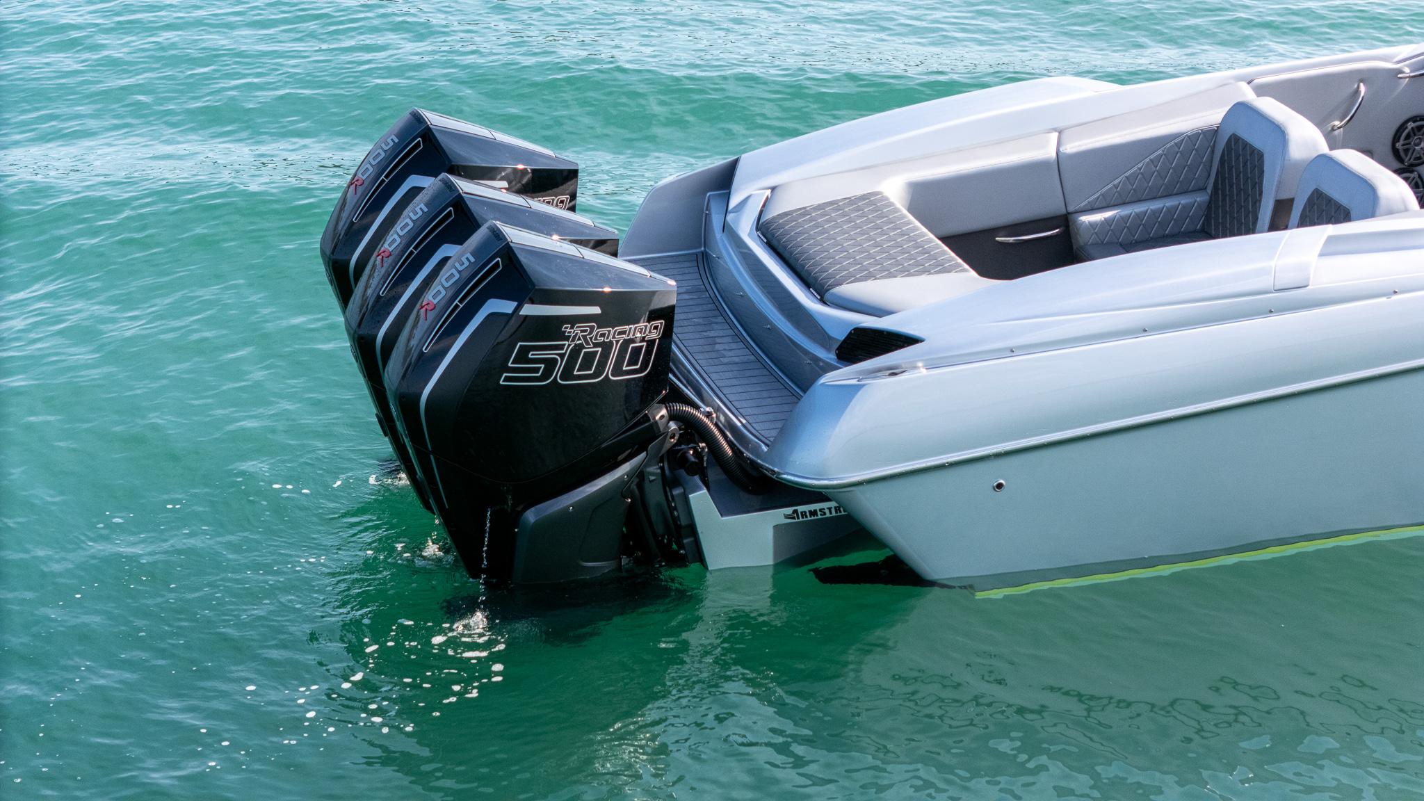 2017 Nor-Tech 3900 Super-VEE with triple outboard engines on clear water.