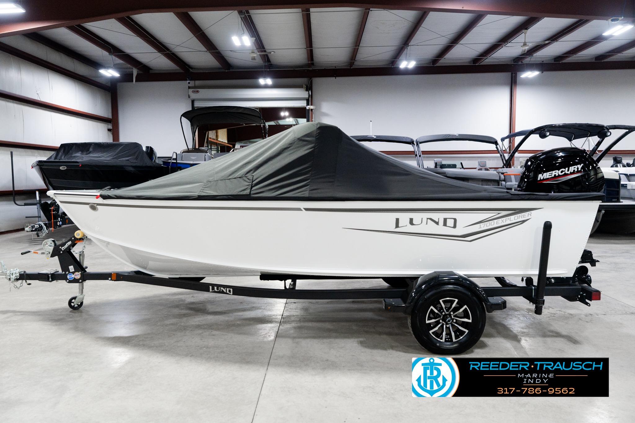 2026 Lund 1700 Explorer Sport boat in showroom, covered and on trailer.