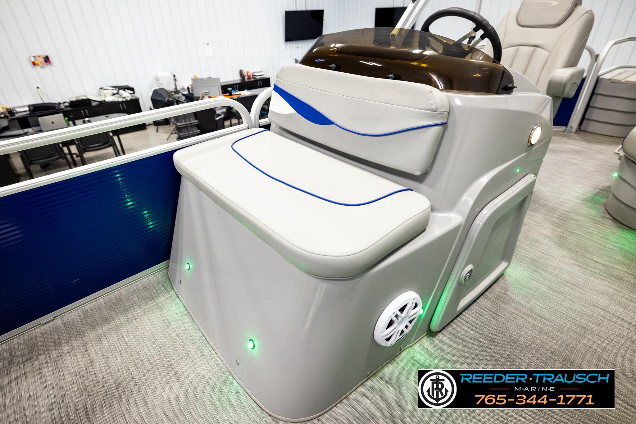2021 Bennington 20 SV boat interior with gray seating and blue accents.
