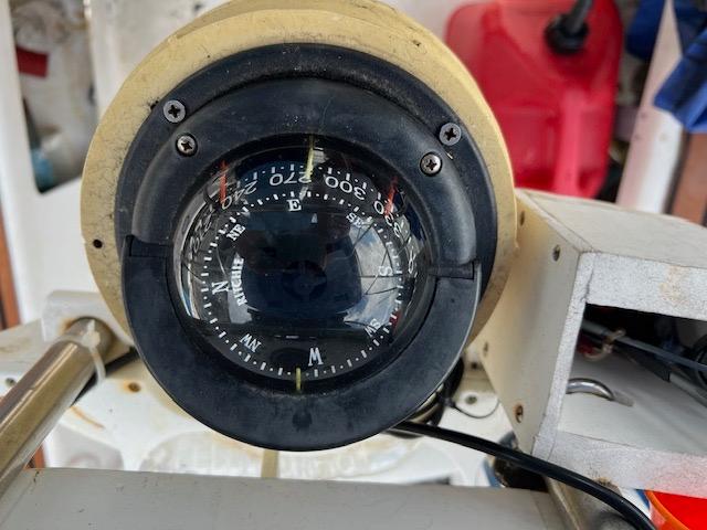 Close-up of a 1999 Contour 34 SC boat compass.
