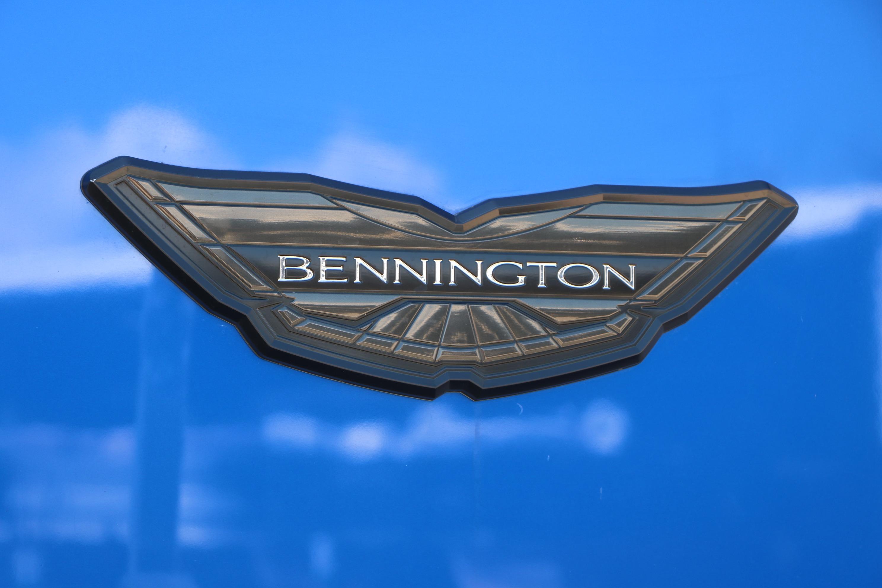 Bennington 23 RX Swingback 2024 logo on a vibrant blue background.
