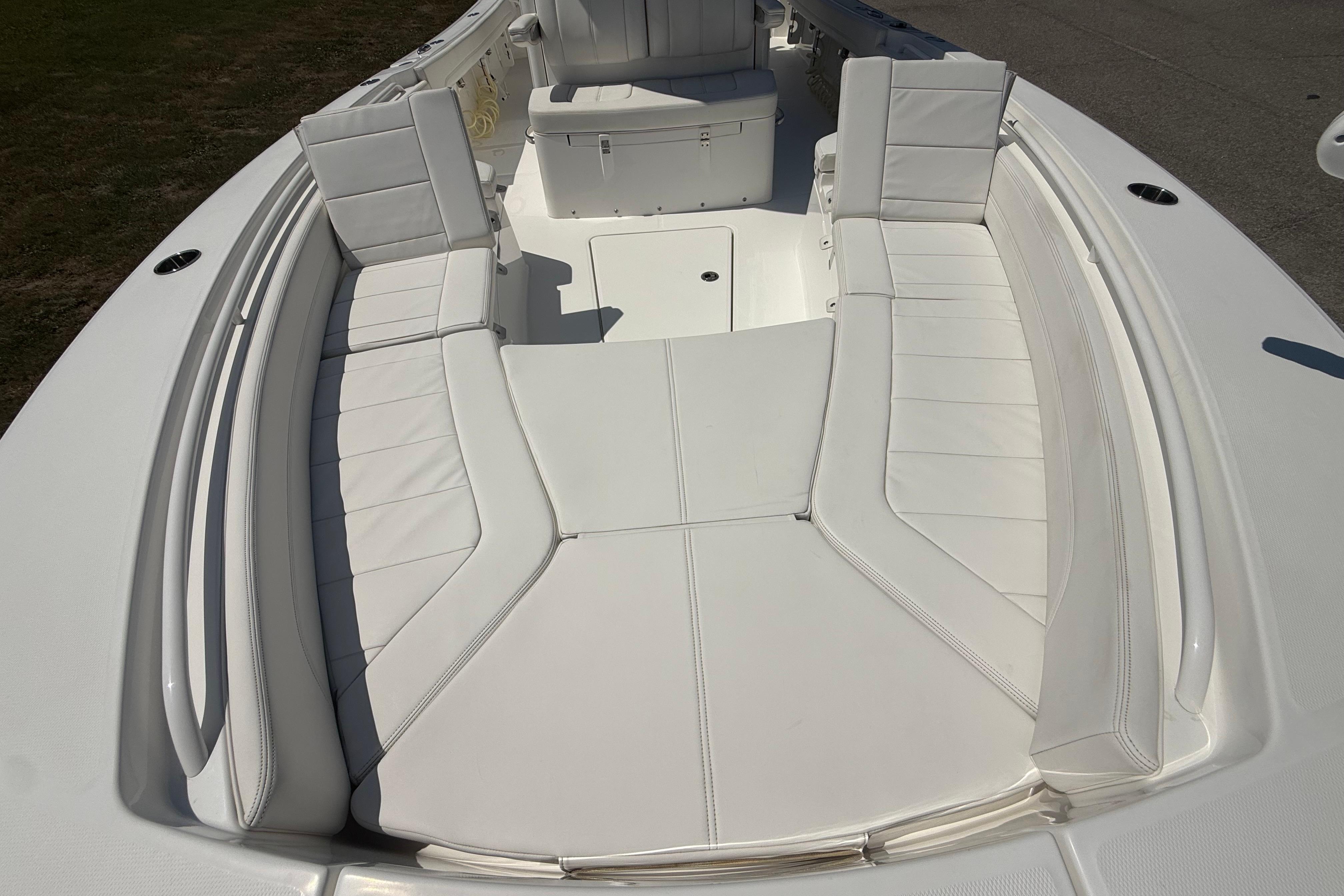 2023 Regulator 26XO boat with spacious white seating area.