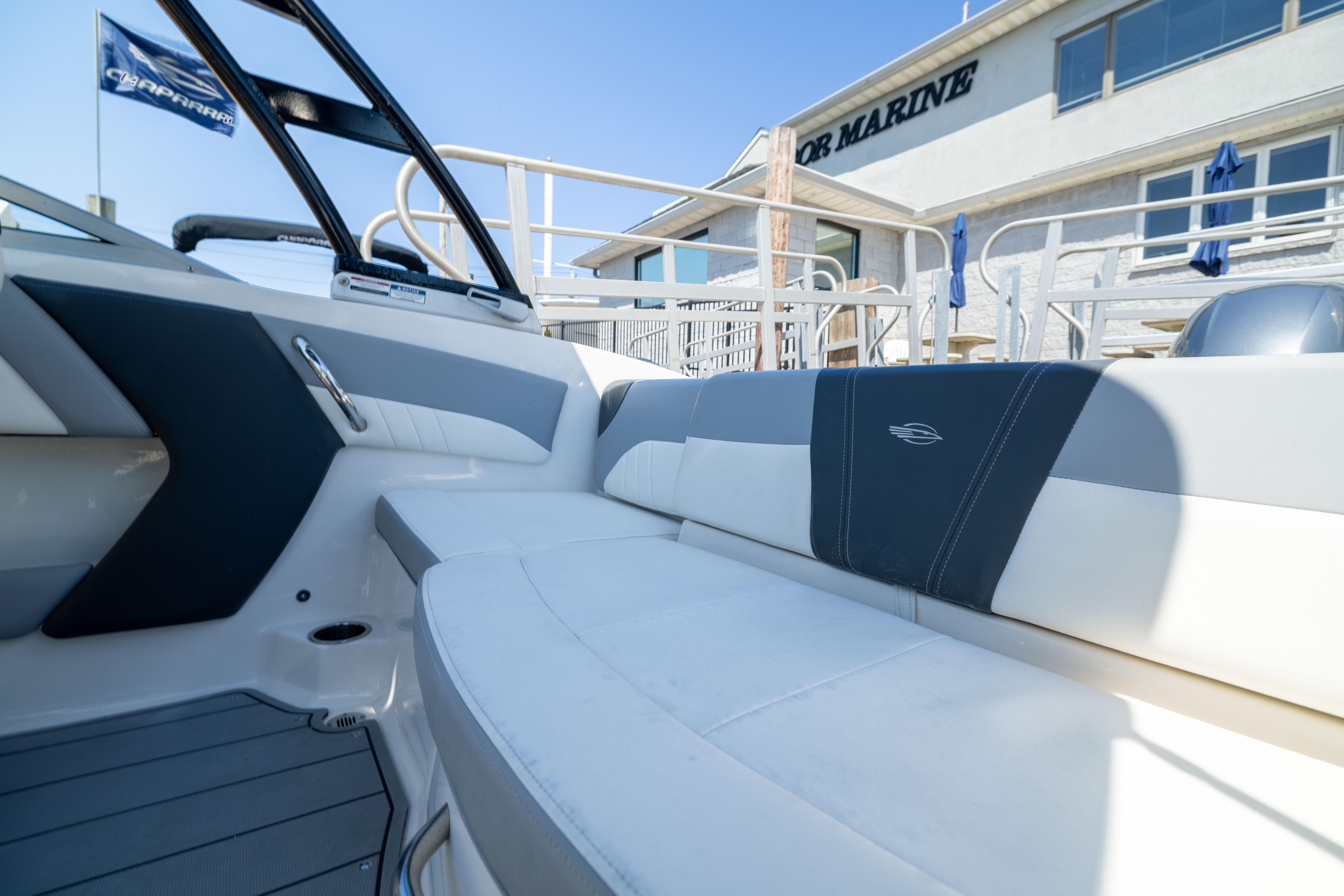2022 Chaparral 21 SSi OB boat interior with sleek seating and modern design.