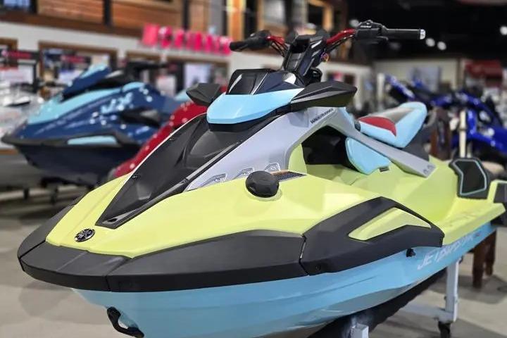 2025 Yamaha WaveRunner JetBlaster PRO 3-Up in showroom, vibrant colors, sleek design.