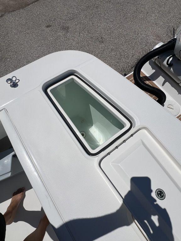 2021 Regulator 41 boat deck with open storage compartment.