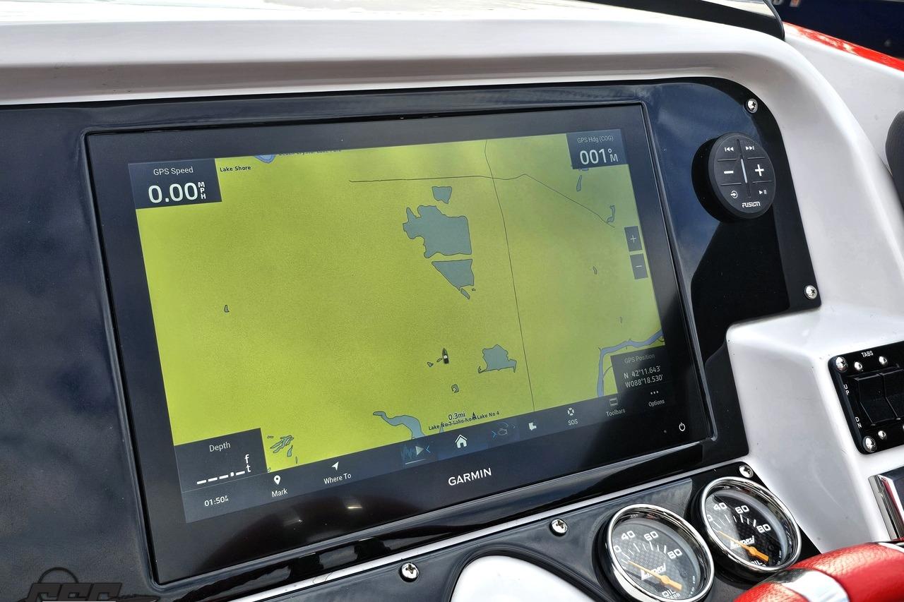 Garmin GPS display on 2008 Donzi 38 ZR boat dashboard, showing navigation map.